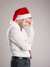 Picture_of_sad-man-santa-hat-bigst